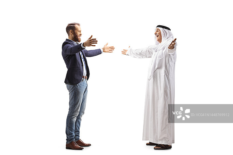 年轻人会见并问候一个阿拉伯人图片素材