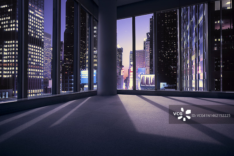 在日落时分，可以看到纽约时代广场的空办公室或公寓图片素材