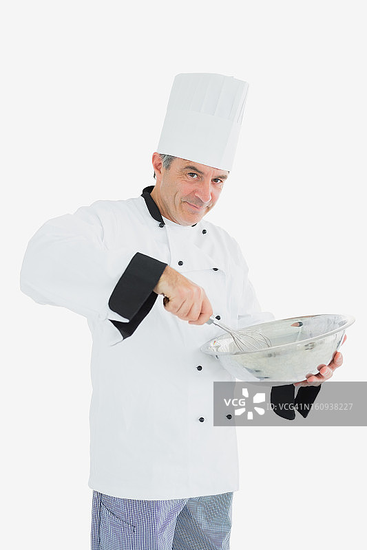 厨师在碗里搅拌食材图片素材
