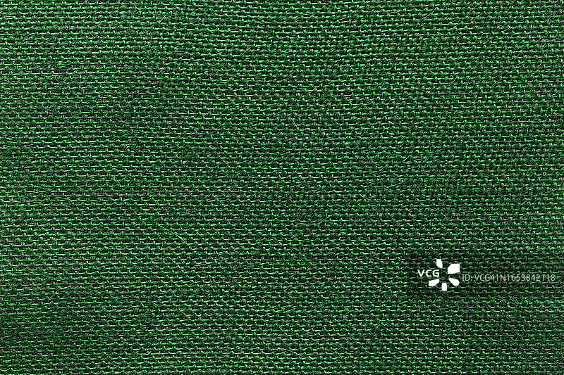 绿色粗布纹理和纺织背景与全框架。图片素材