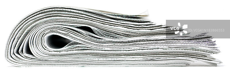 叠成一堆孤立的报纸图片素材