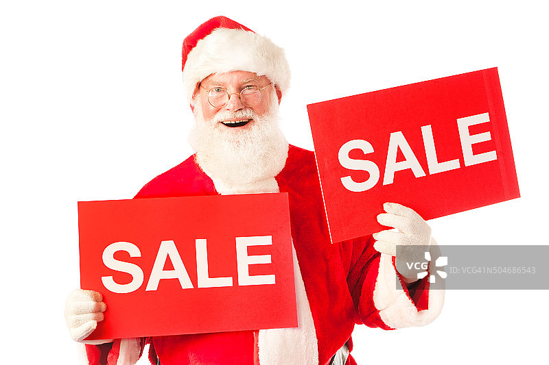 圣诞老人拿着红色的销售牌子在白色的背景图片素材