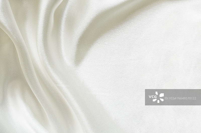 白色折叠丝绸织物的特写图片素材