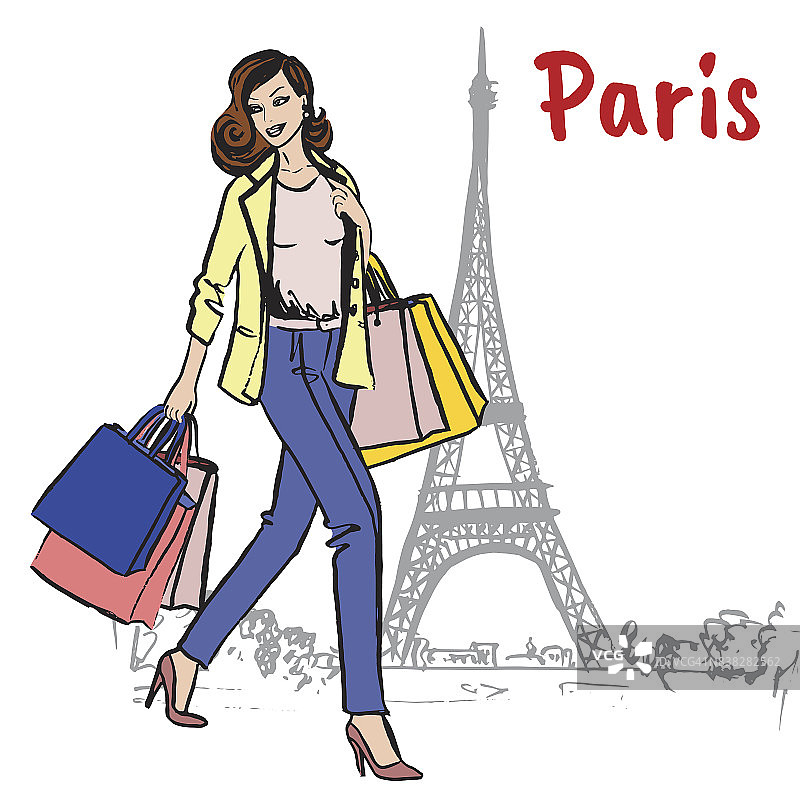 巴黎一个拿着购物袋的女人图片素材