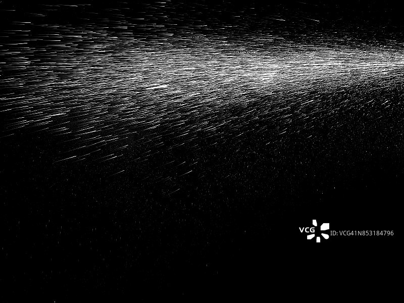 压力水滴漂浮在空气中的模式在一个黑色的背景图片素材