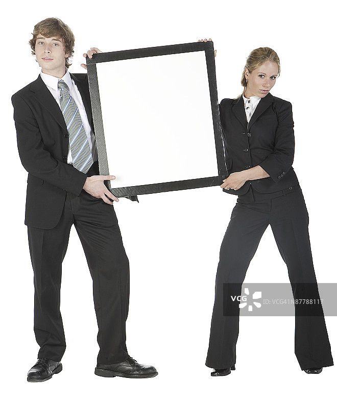 两个商人拿着白板摆姿势图片素材