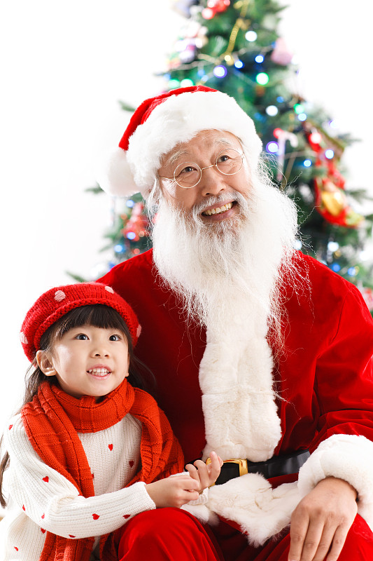 圣诞老人与小女孩过圣诞节图片素材