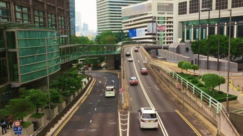 在中国香港中环行驶的车辆图片下载