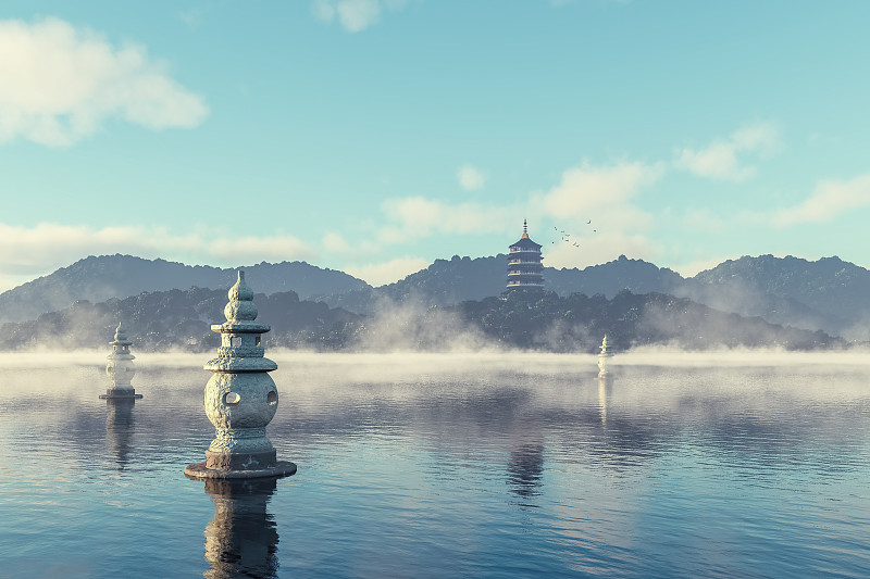 晨雾和阳光下的西湖三潭印月和雷峰塔景区图片素材