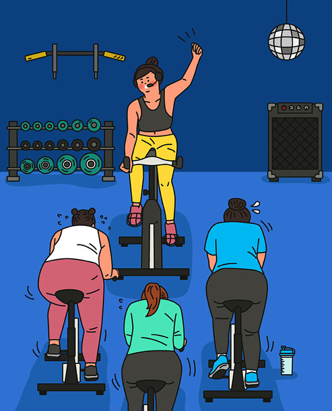 参加动感单车课程减肥的女性图片素材