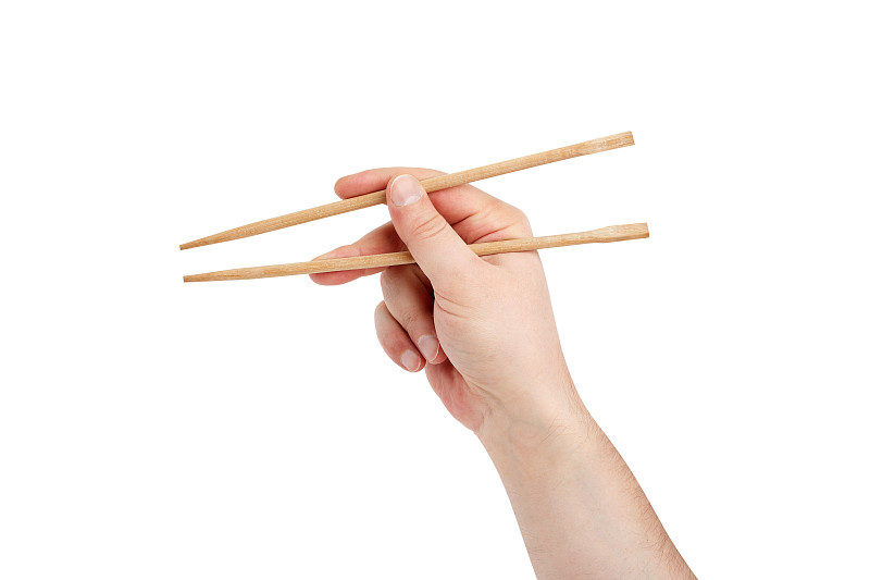 男子用筷子吃寿司，孤立在白色背景上图片下载