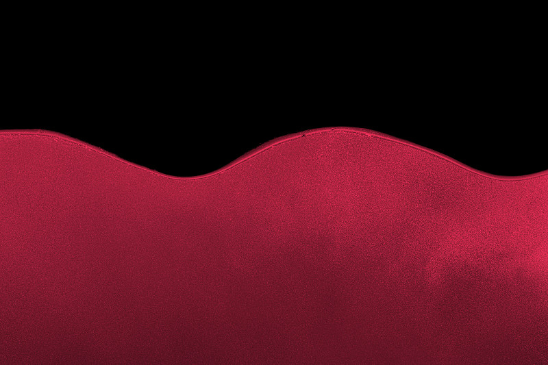 洋红色的沸腾沸腾的水在黑色的背景。2023年的颜色，洋红色万岁。图片下载