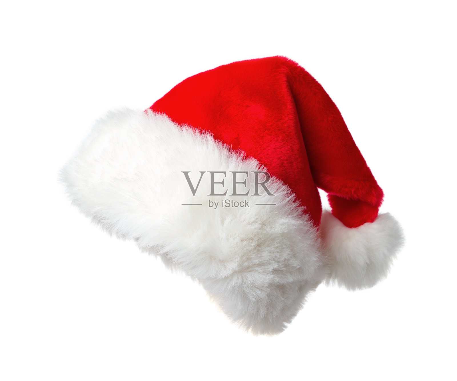 圣诞老人的帽子放在白色的背景上照片摄影图片