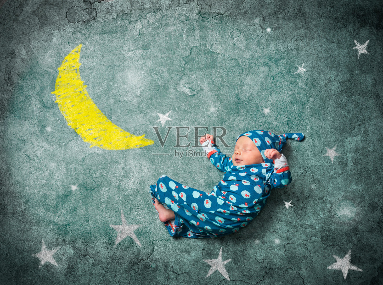 和星星一起睡觉的宝宝照片摄影图片