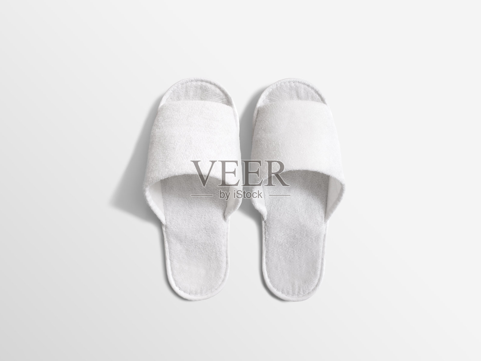 一双空白的白色家用拖鞋，设计模型照片摄影图片