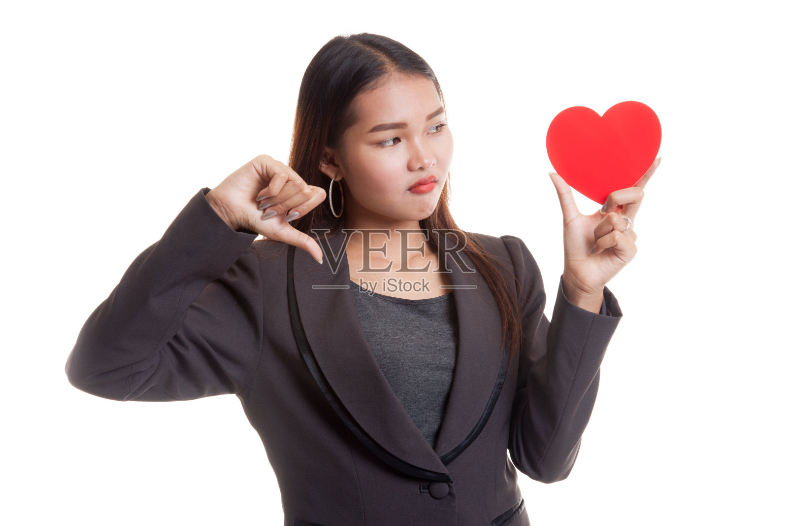 亚洲商业女性拇指与红心。照片摄影图片