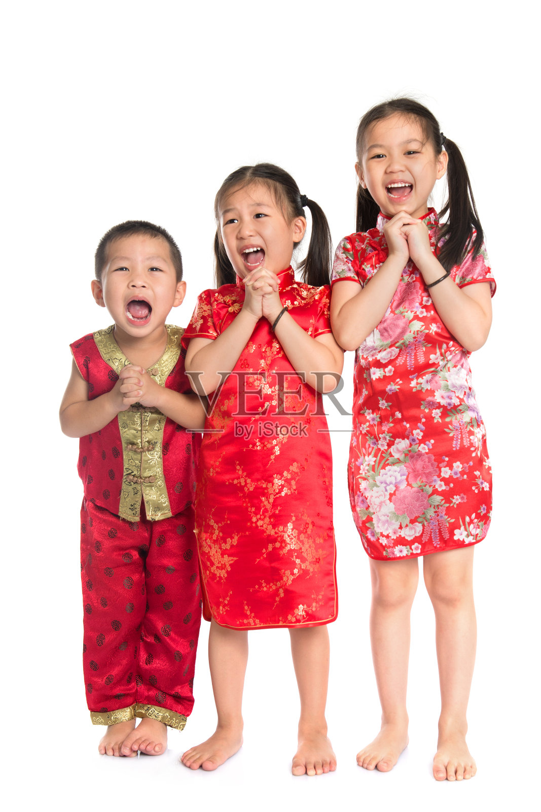 亚洲的小朋友们祝你们春节快乐照片摄影图片