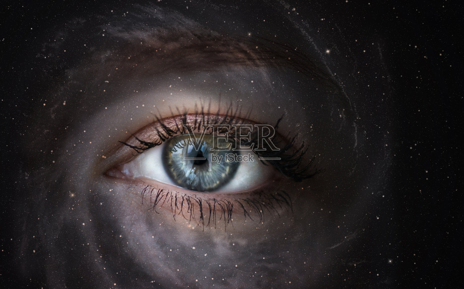 星系与眼睛。照片摄影图片