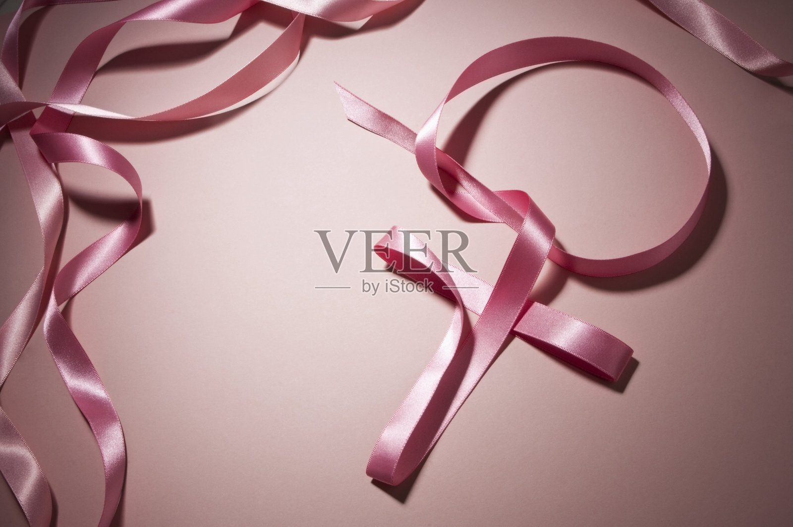 粉红丝带是国际妇女节的标志照片摄影图片