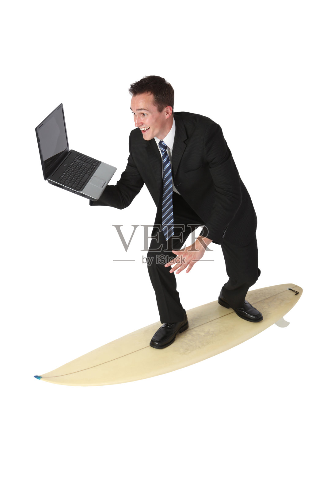 商人在冲浪板上使用笔记本电脑照片摄影图片