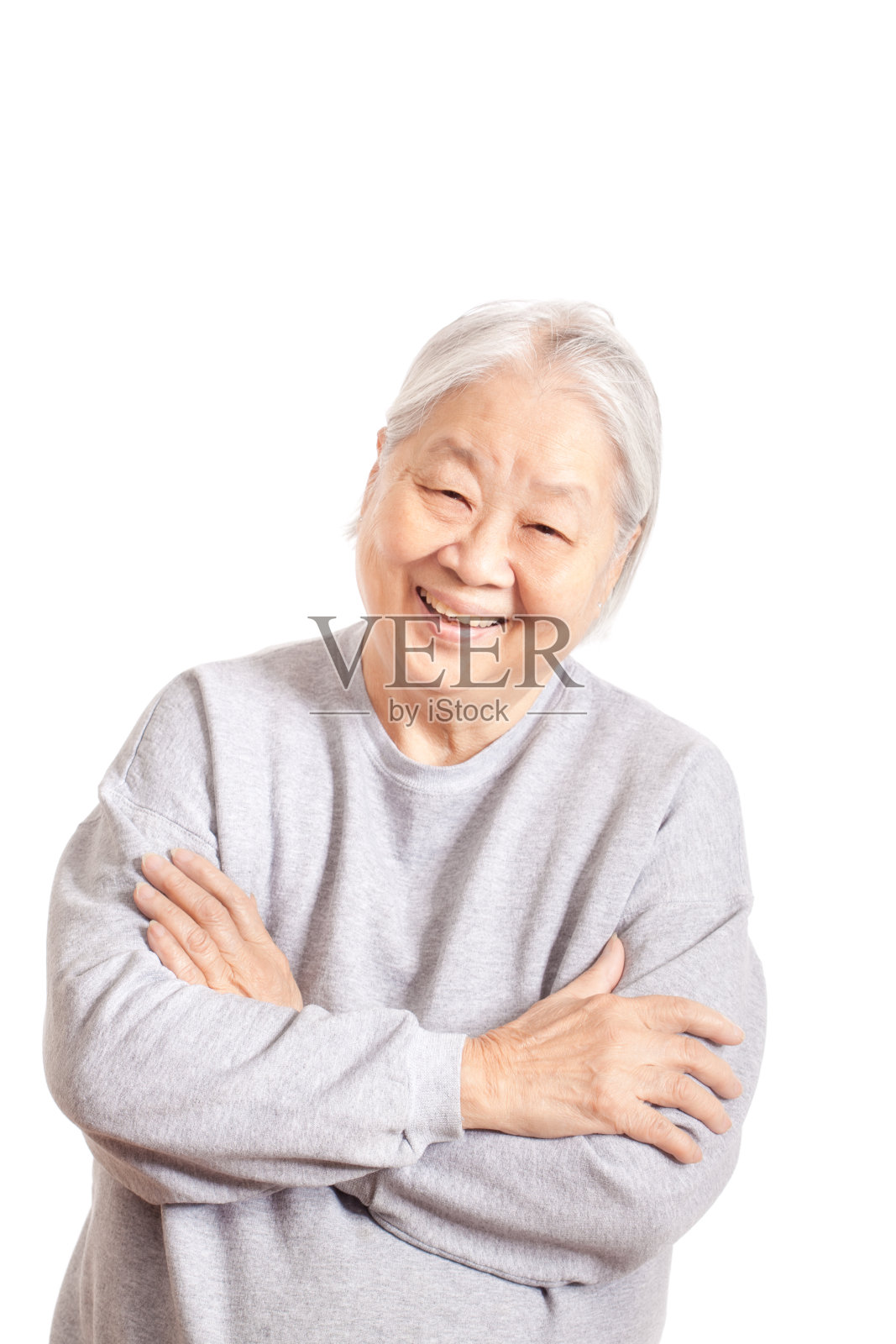 快乐微笑的亚洲资深女性在白色的背景照片摄影图片