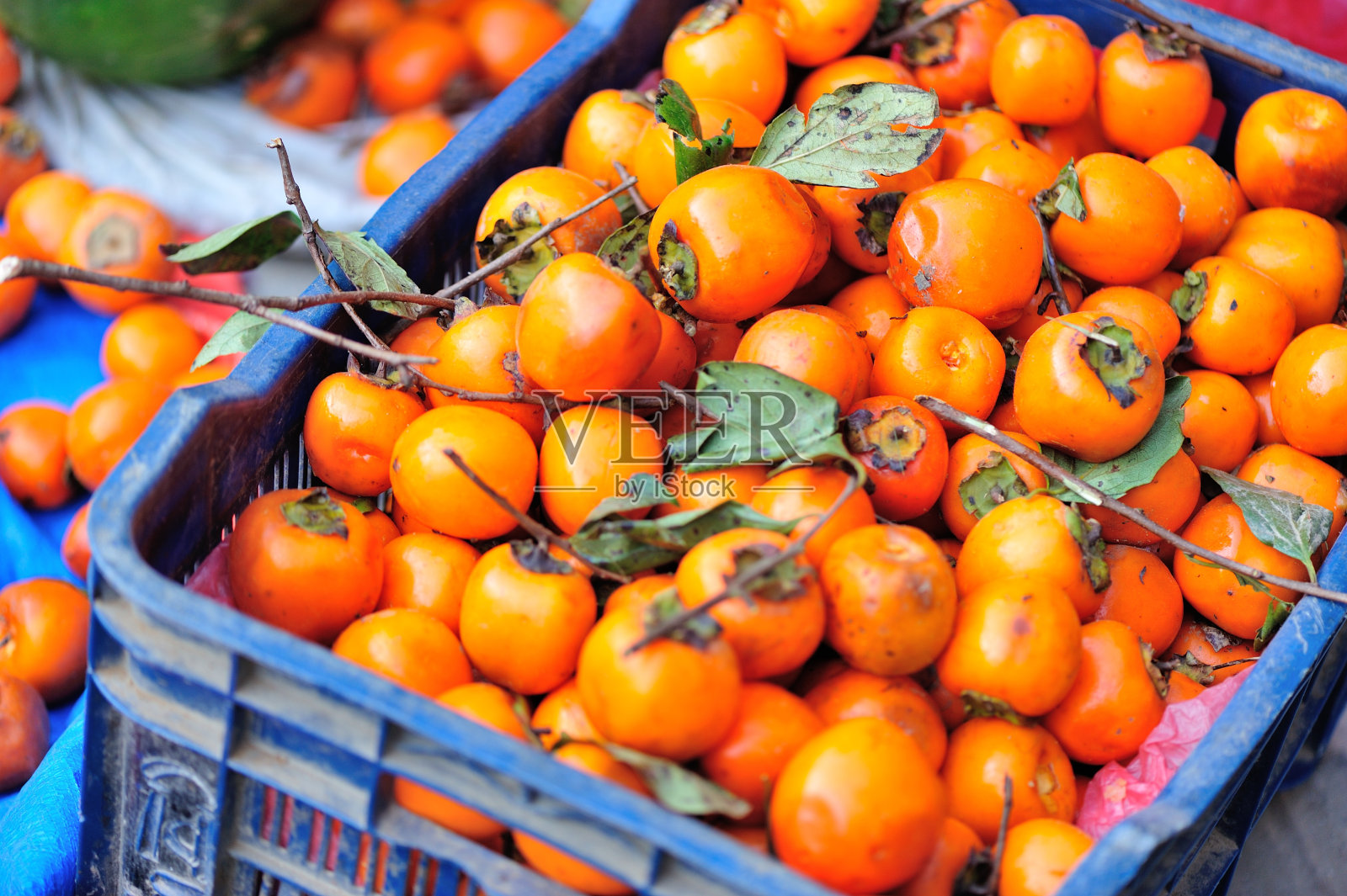 尼泊尔街头商店出售的新鲜有机柿子照片摄影图片