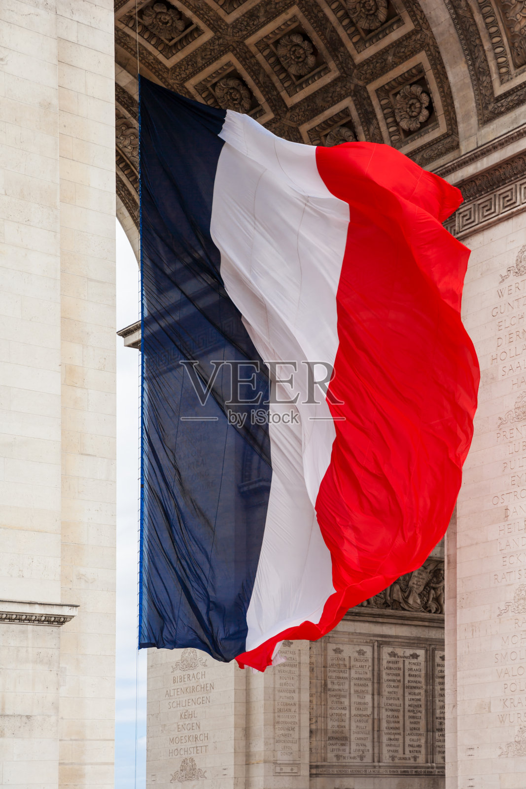 法国国旗与凯旋门细节，巴黎，法国照片摄影图片
