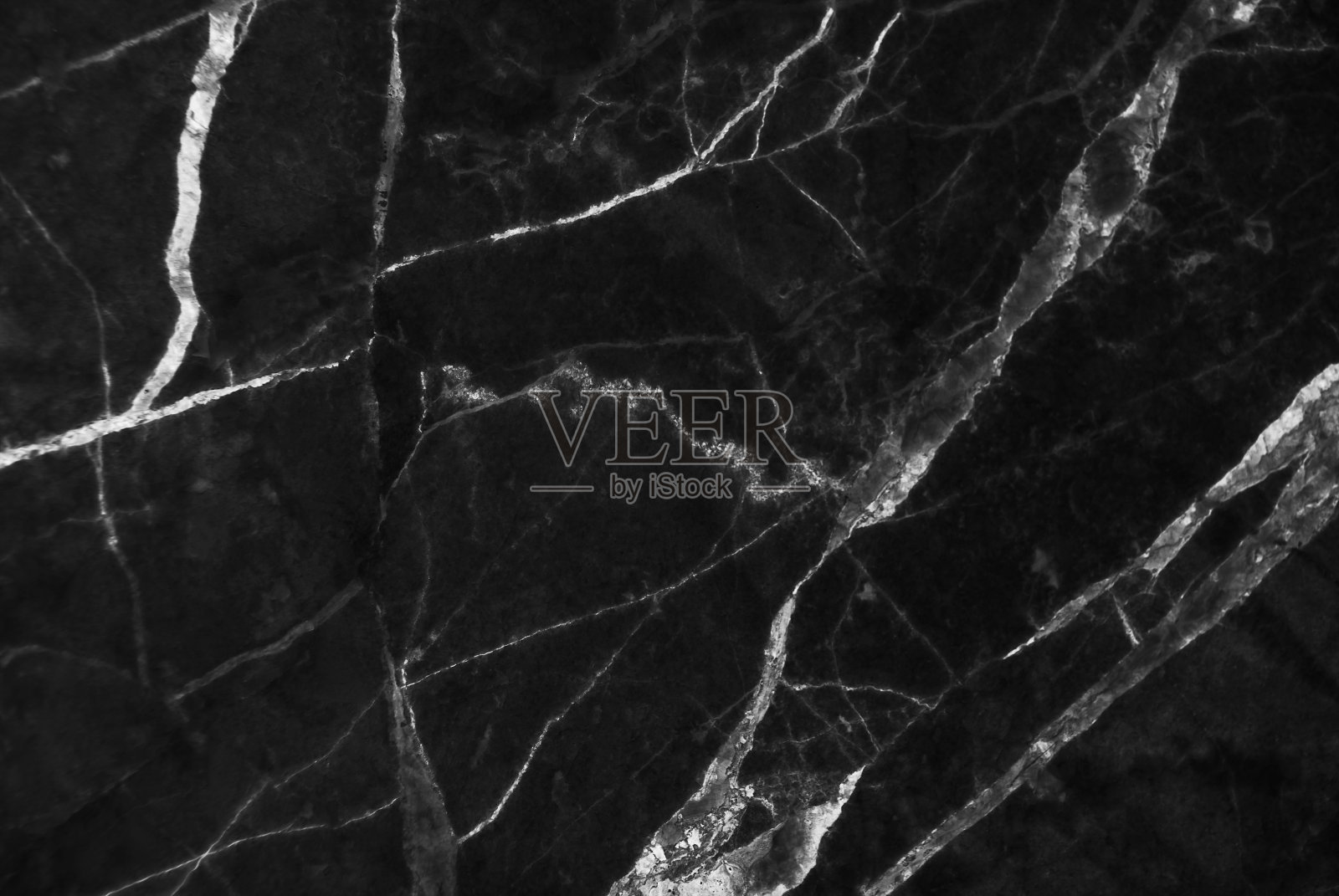黑色大理石纹理背景，详细的天然大理石。照片摄影图片
