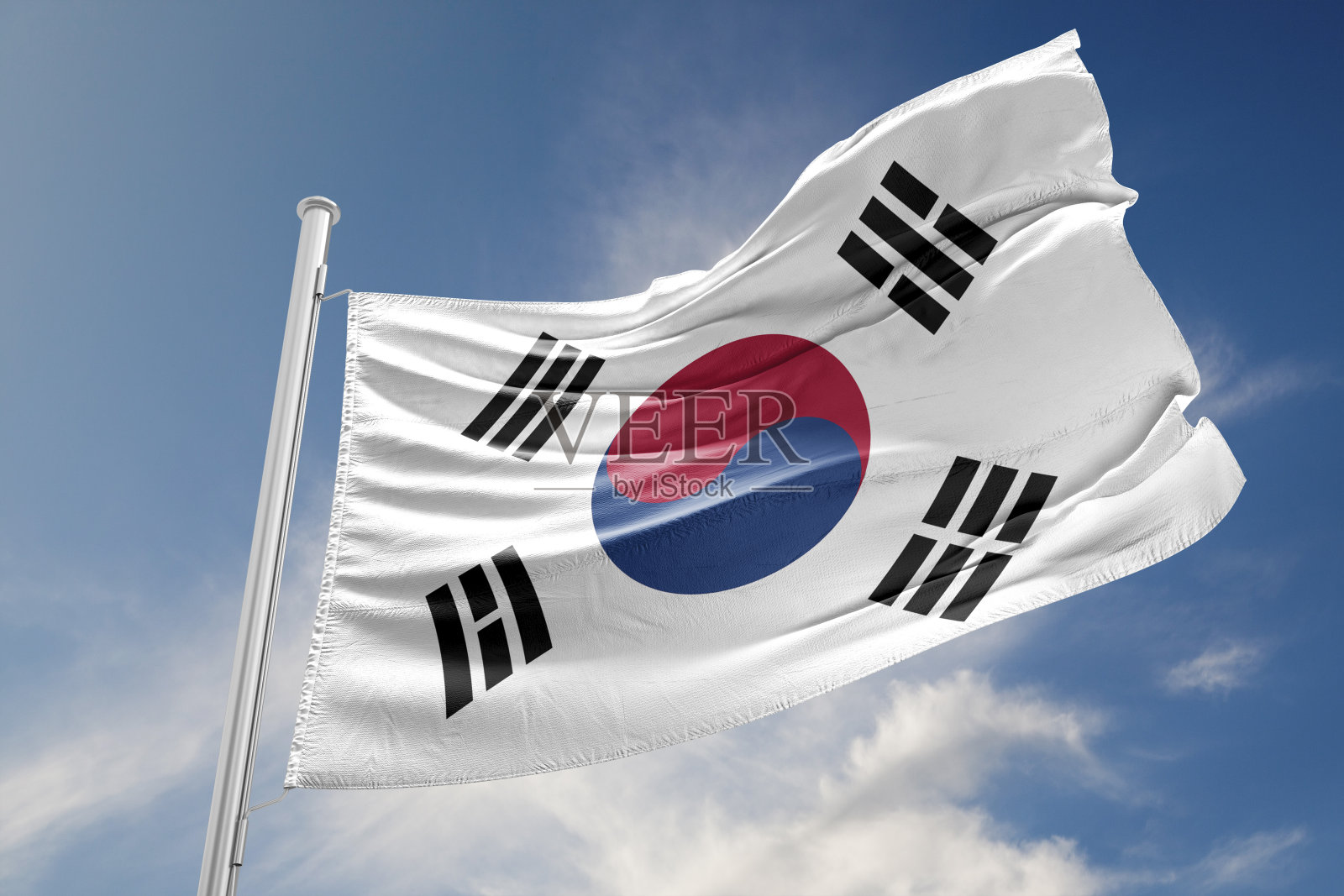 韩国国旗在蓝天下飘扬照片摄影图片