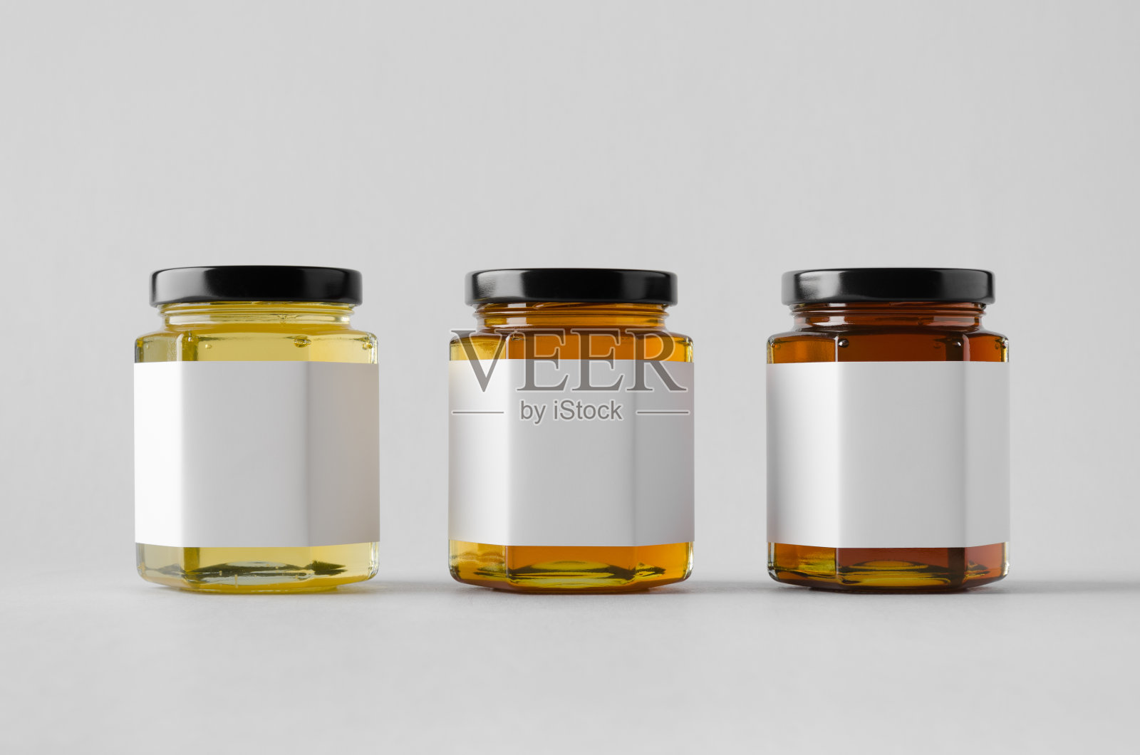 蜂蜜罐模型-三个罐子。空白的标签照片摄影图片