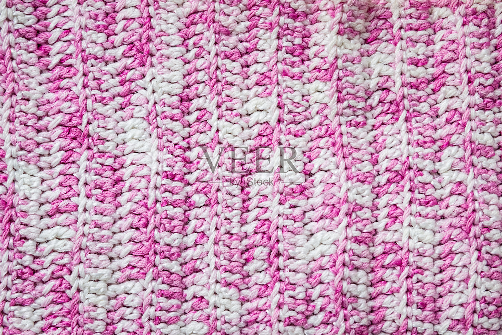 针织的背景。毛线样品用羊毛编织的样品编织模式。照片摄影图片