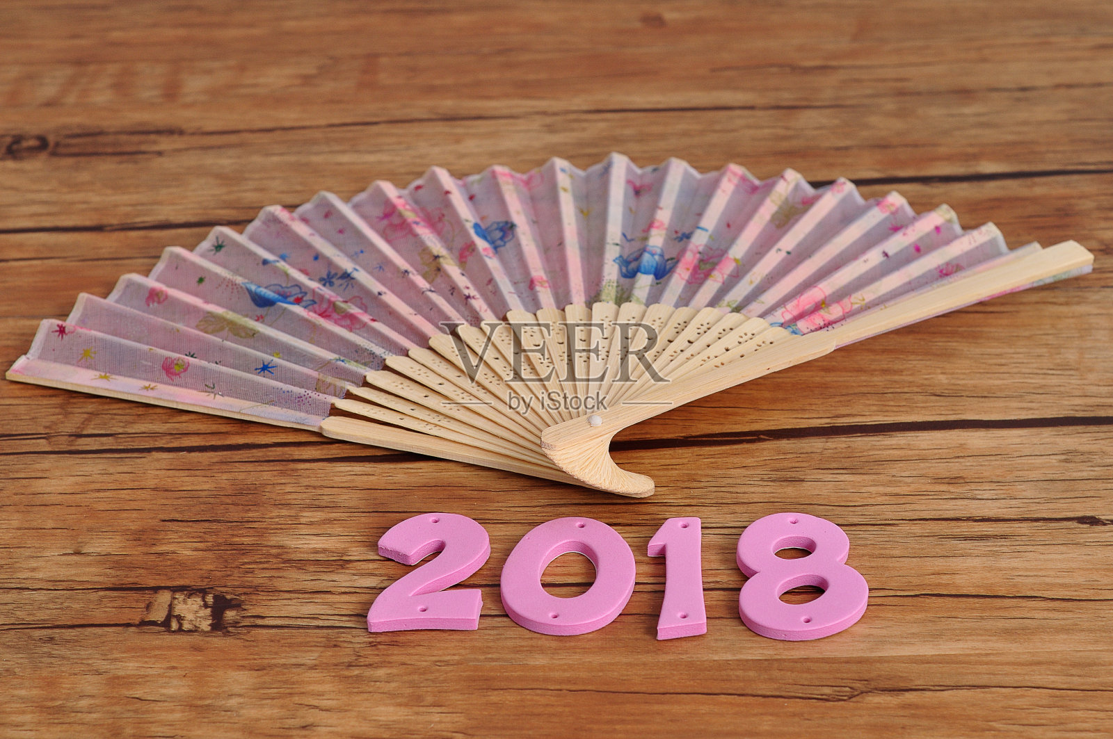 2018年中国新年用的粉色手扇照片摄影图片