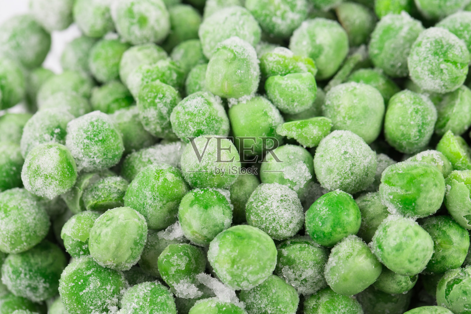绿色冷冻豌豆。照片摄影图片