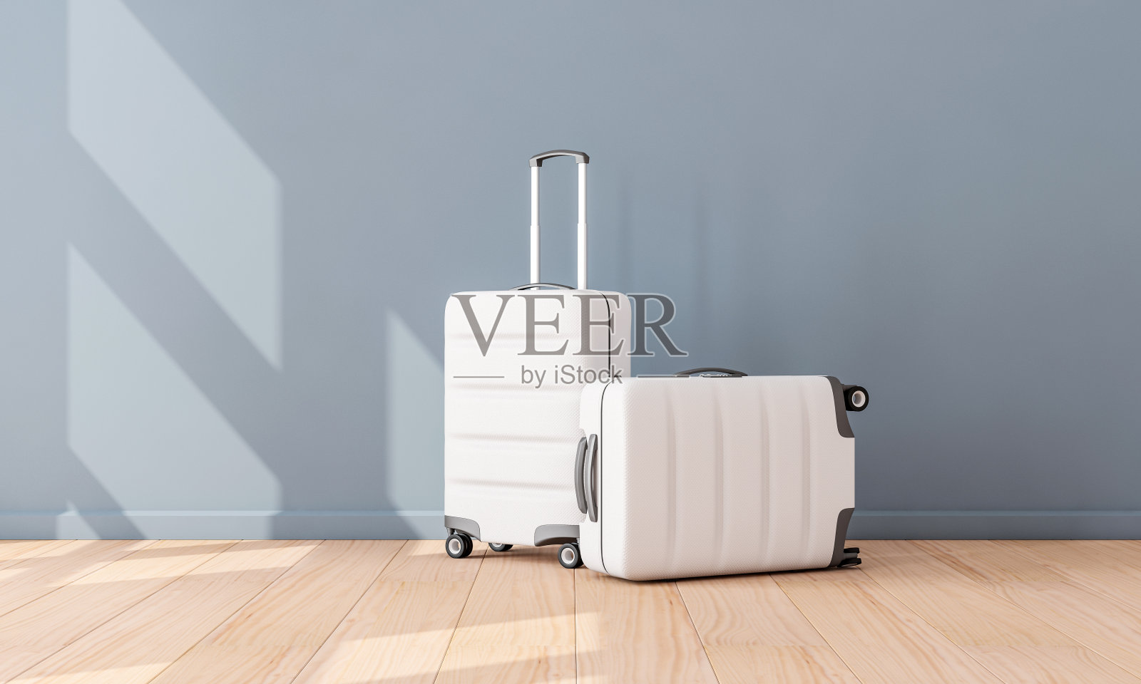 两个白色行李模型在空房间，手提箱，行李照片摄影图片