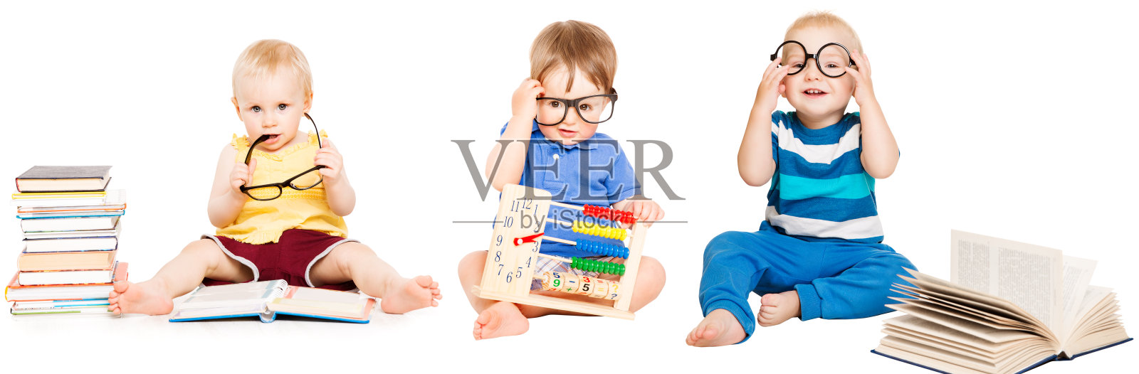 婴儿阅读书，儿童早期教育，智能儿童组在眼镜照片摄影图片