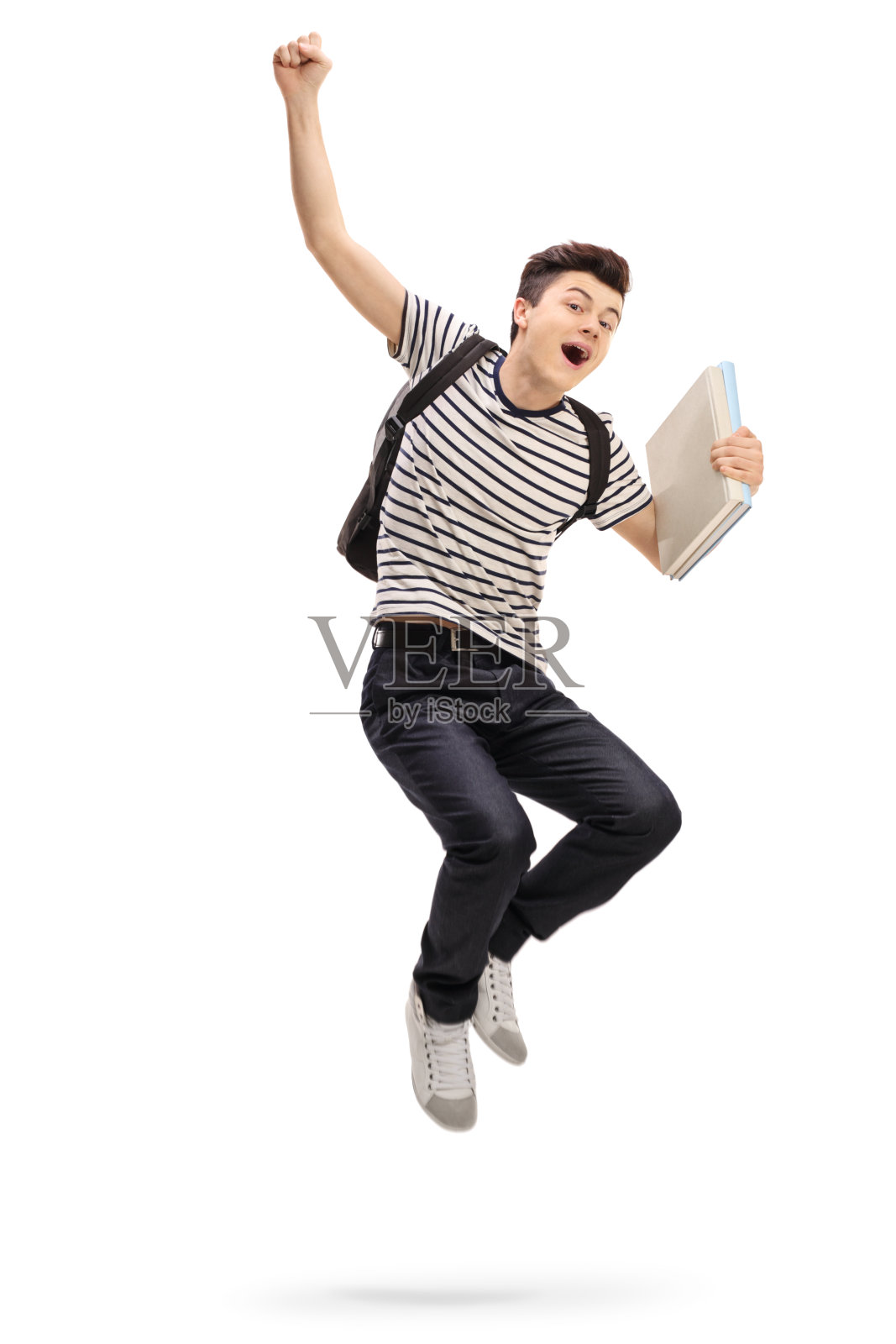喜出望外的青少年学生跳着，做着幸福的手势照片摄影图片