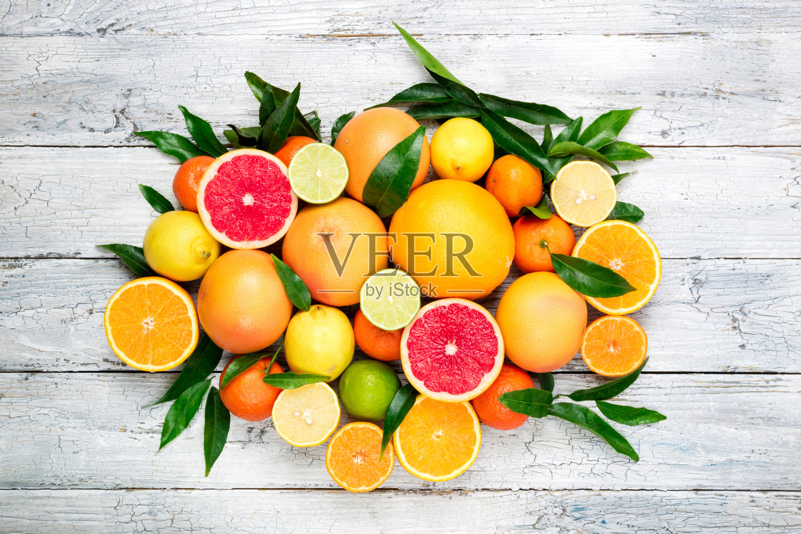 柑橘类水果的背景。什锦新鲜柑橘类水果。橘子，葡萄柚，柠檬，青柠，橘子照片摄影图片
