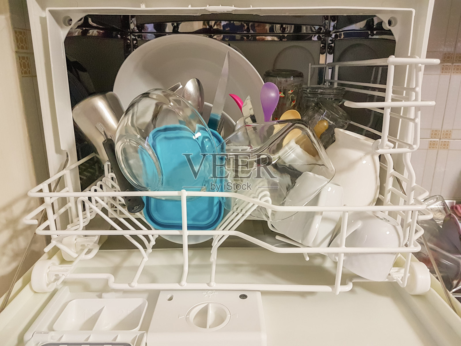 洗衣机盘子玻璃勺子蓝色塑料照片摄影图片