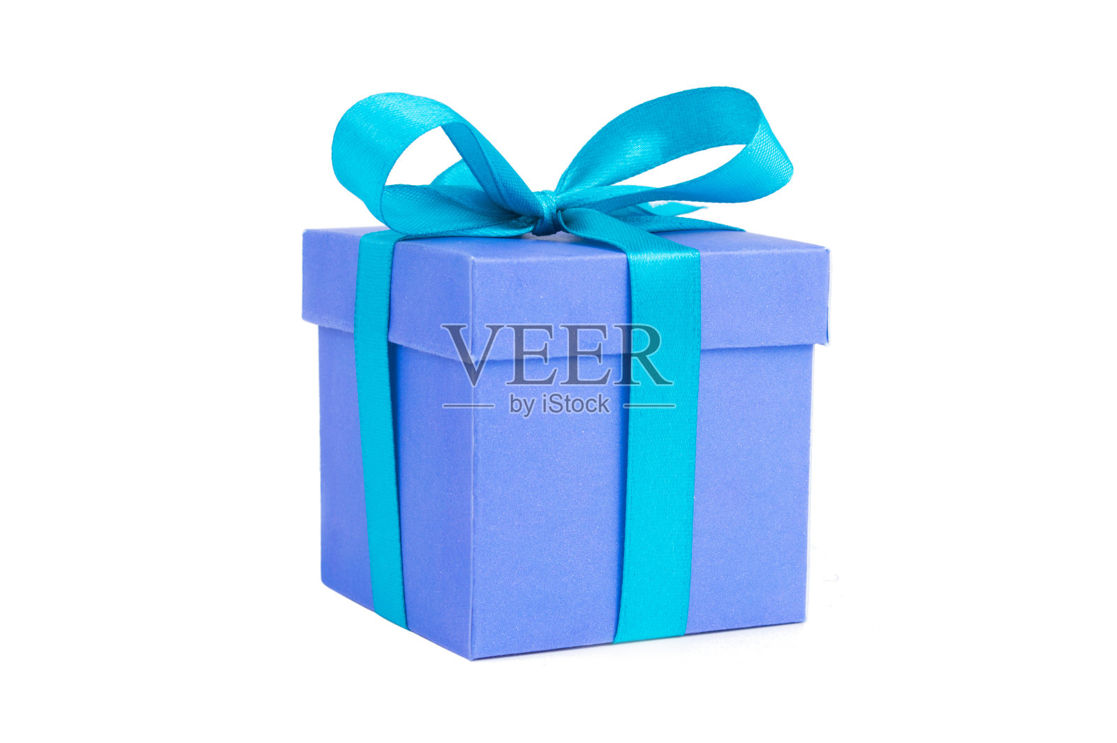 一个蓝色的礼盒与蓝色丝带孤立在白色的背景为圣诞节和新年的形象照片摄影图片