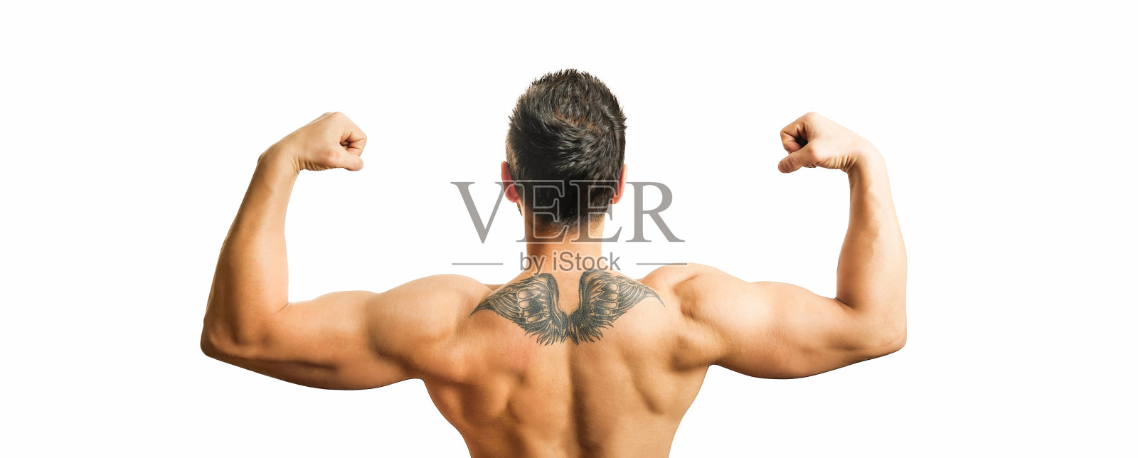 肌肉男子的背部与纹身在白色的背景照片摄影图片