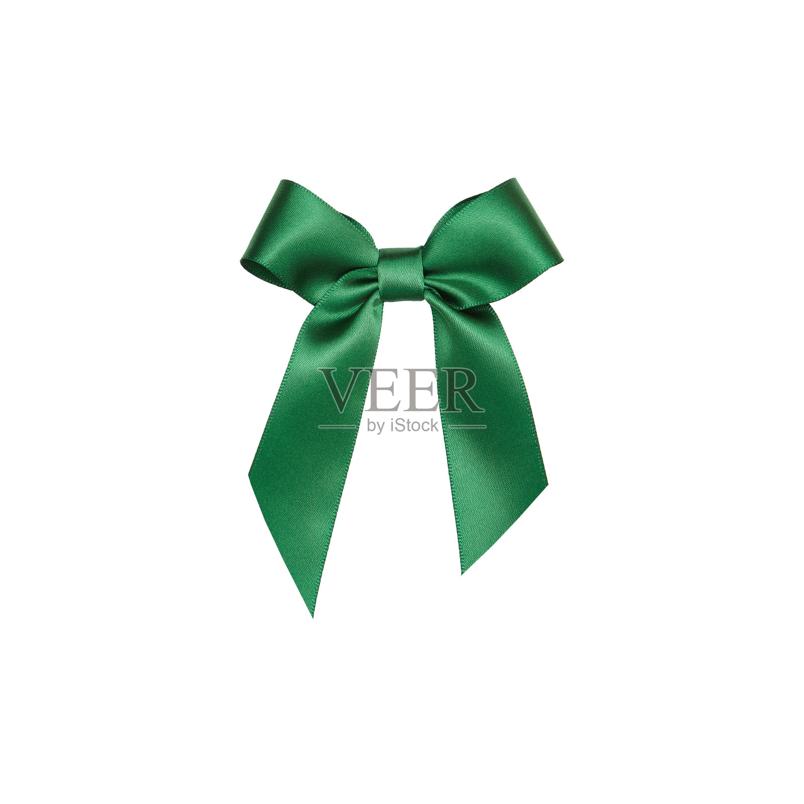绿色的礼品丝带系在一个蝴蝶结在白色的背景，剪出顶视图照片摄影图片