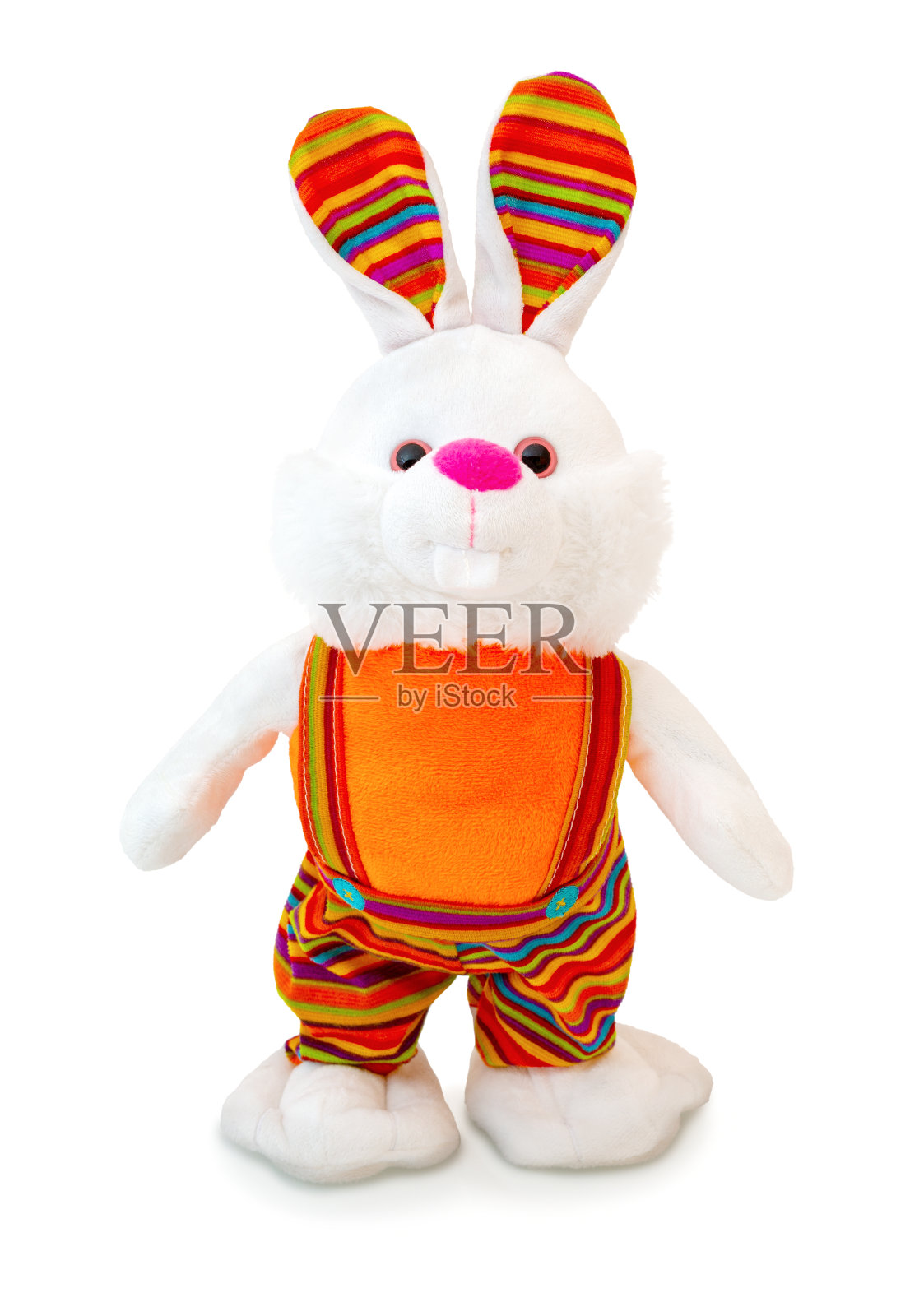 彩色兔毛绒娃娃孤立在白色背景。兔子毛绒填充木偶在白色的背景。彩色毛绒兔子玩具。复活节兔子。复活节兔子。照片摄影图片