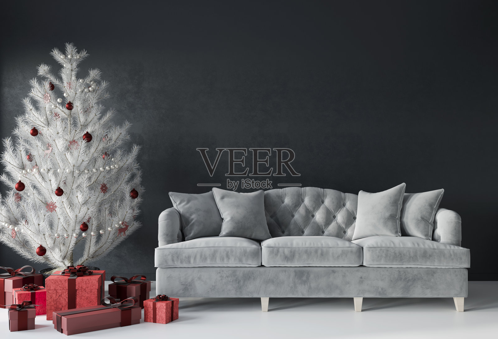 一个豪华的沙发和一棵白色的圣诞树和红色的礼物喜庆的客厅照片摄影图片