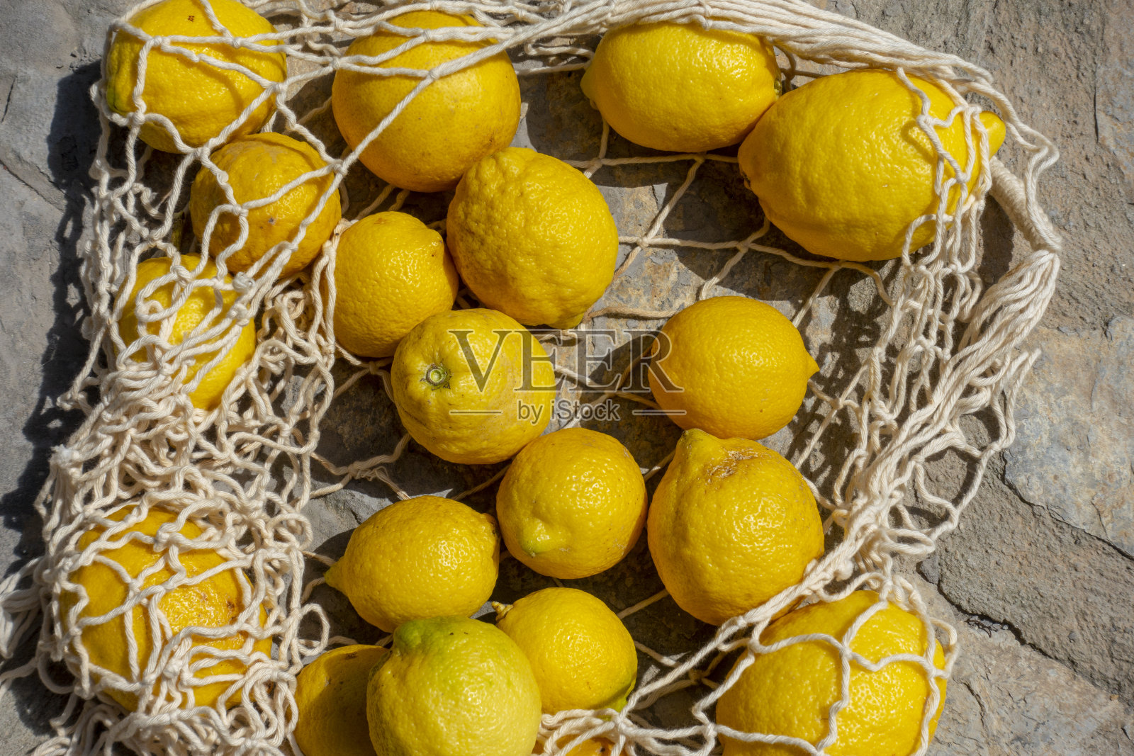 网里的柠檬照片摄影图片