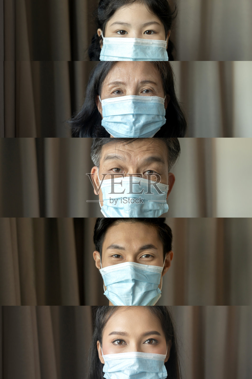 亚洲幼女的肖像，幼小可爱的女儿戴着医用口罩。居家隔离大流行性冠状病毒疾病。Covid-19疫情预防理念。照片摄影图片