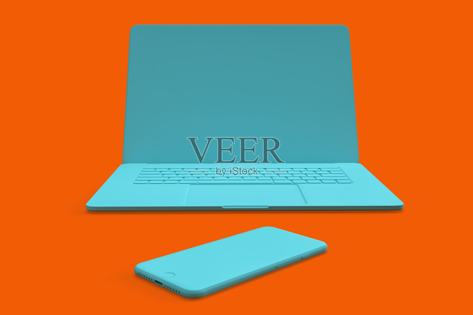橙色背景下的蓝绿色笔记本电脑和智能手机的简约构图照片摄影图片