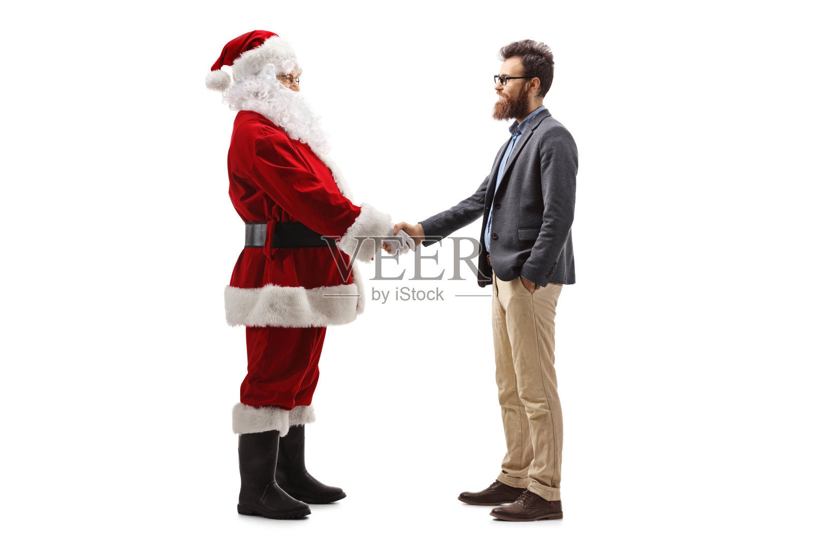 圣诞老人与一名满脸胡须的男子握手的全身照照片摄影图片