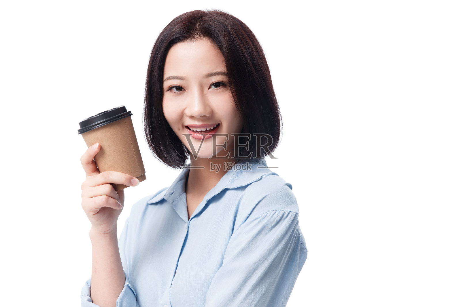 女白领手拿咖啡杯照片摄影图片