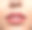 女性嘴唇的特写，涂着光滑的口红素材图片