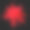红色粉末在黑色背景上爆炸素材图片